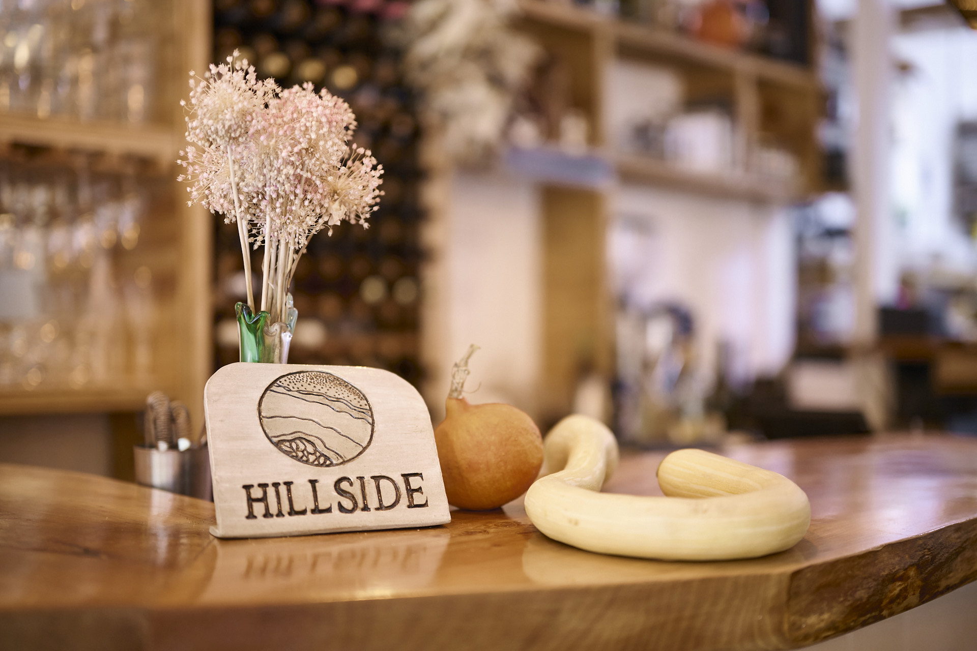 Hillside logo on the counter at Hillside Kitchen & Cellar